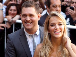 This March 31, 2011 file photo shows Canadian pop star Michael Buble, left, and his wife, Luisana Lopilato, in Buenos Aires, Argentina. (THE CANADIAN PRESS/AP/Natacha Pisarenko)