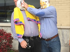 Department of Fisheries and Oceans and Canada Coast Guard surpassed their United Way employee campaign by more than 20 per cent. As a result of a fundraiser held at DFO, Dave Burton, Regional Director General, Fisheries and Oceans Canada, takes a pie in the face; and Jamie Forsythe, Regional Director, Integrated Technical Service with Canadian Coast Guard,had the bucket of ice water poured over his head. Burton thought Forsythe got off easy and gave him a piece of pie, too.
