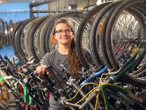 Benita Kliewer, program director for WRENCH, stands with some bikes in her shop in Winnipeg, Man. Monday November 07, 2016. They are gearing up for their Cycle of Giving in December. (Brian Donogh/Winnipeg Sun/Postmedia Network)