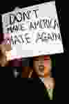 A protester holds a sign during a protest against the election of President-elect Donald Trump in Chicago, Thursday, Nov. 10, 2016. Two days after Trump's election as president, the divisions he exposed only showed signs of widening as many thousands of protesters flooded streets across the country to condemn him. (AP Photo/Nam Y. Huh) ORG XMIT: ILNH106