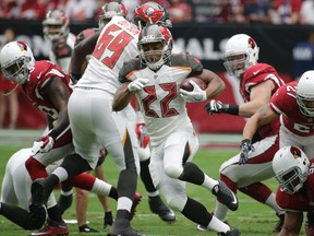 Doug Martin should return to the Bucs backfield on Sunday, but will be eased back in. (AP)