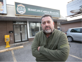 Shane Silva moved out of his realty office about a week ago because a pot shop opened next door. It's wrecked his business.  (Jean Levac, Postmedia)