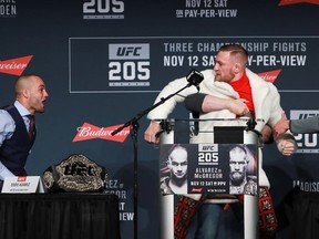 UFC president Dana White separates Conor McGregor and Eddie Alvarez during the UFC 205 press conference at The Theater at Madison Square Garden on Nov. 10, 2016 in New York City. (Michael Reaves/Getty Images)