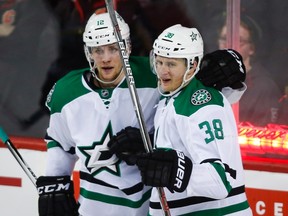 Lauri Korpikoski celebrates a goal against the Flames Thursday night in Calgary. (The Canadian Press)