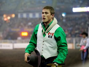 Kody Lamb had a 81.5 point ride Thursday during CFR at Northlands Coliseum. (David Bloom)