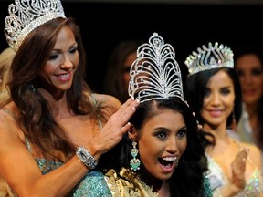 Mrs. Canada Ashley Callingbull-Burnham, centre, celebrates after being crowned Mrs. Universe during the Mrs. Universe 2015 pageant final in Minsk on August 29, 2015. SERGEI GAPONSERGEI GAPON/AFP/Getty Images