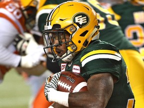 Edmonton Eskimos running back Shakir Bell (33) on the run against the BC Lions during CFL action at Commonwealth Stadium in Edmonton Friday, September 23, 2016.