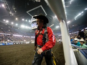 Bareback rider Jake Vold takes part in the second go-round of the Canadian Finals Rodeo at Northlands Coliseum, in Edmonton on Thursday Nov. 9, 2016. David Bloom / Postmedia
