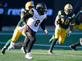 Hamilton Tiger Cats' Jeremiah Masoli runs in for a touchdown during second half CFL playoff action against the Edmonton Eskimos, in Hamilton on Nov. 13, 2016. (THE CANADIAN PRESS/Frank Gunn)