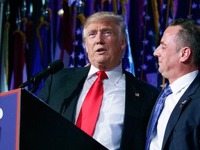 In this Wednesday, Nov. 9, 2016, photo, President-elect Donald Trump, left, stands with Republican National Committee Chairman Reince Priebus during an election night rally in New York.   (AP Photo/Evan Vucci)