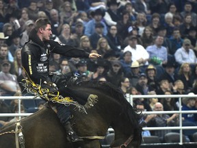 Jake Vold rode to victory on Reckless Margie Sunday at the Canadian Finals Rodeo at Northlands Coliseum. (Ed Kaiser)