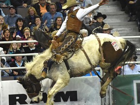 Nanton's Clay Elliott took the overall title in saddle bronc during the Canadian Finals Rodeo at the Northlands Coliseum. (Ed Kaiser)