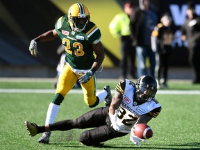 Edmonton Eskimos' Marcell Young looks on as Hamilton Tiger Cats' Brian Tyms misses a touchdown catch during first half CFL playoff action in Hamilton on Nov. 13, 2016. (THE CANADIAN PRESS/Frank Gunn)