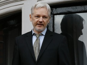 In this Feb. 5, 2016 file photo, WikiLeaks founder Julian Assange speaks from the balcony of the Ecuadorean Embassy in London. Assange will be interviewed about Swedish sex crime allegations at the Ecuadorean Embassy in London on Monday, Nov. 14, 2016. The interview will be conducted by an Ecuadorean prosecutor, with a Swedish prosecutor present. (AP Photo/Kirsty Wigglesworth, File)