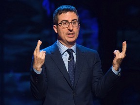 In this Feb. 28, 2015 file photo, John Oliver speaks at Comedy Central's "Night of Too Many Stars: America Comes Together for Autism Programs" in New York. Oliver used nearly the entire season finale of his HBO show on Nov. 13, 2016, to criticize President-elect Donald Trump. (Photo by Charles Sykes/Invision/AP, File)