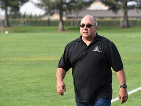 In this Feb. 26, 2016, file photo, Stanislaus County Sheriff's Deputy Dennis Wallace walks at Gemperle Fields in Turlock, Calif. Wallace, a 20-year-veteran, was fatally shot Sunday, Nov. 13, 2016, at point-blank range as he checked on a report of a suspicious van parked near a fishing access spot outside the city of Hughson, about 10 miles southeast of Modesto, Stanislaus County Sheriff Adam Christianson said. (Joan Barnett Lee/The Modesto Bee via AP, File)