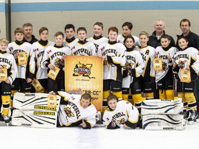 Members of the Mitchell Pee Wees pose with the championship banner after winning the BB-CC division title of the 61st annual Pee Wee tournament in town this past weekend – the first time in 11 years a Mitchell team has won the rep title. The Meteors blanked Listowel 6-0 in the final. The squad continues tournament play with the Legion-sponsored event this upcoming weekend in Lucknow. JEFF LOCKHART PHOTO