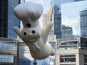 The Pillsbury Doughboy balloon floats during the 89th Annual Macy's Thanksgiving Day Parade in New York City in this Nov. 26, 2015 file photo.  (TIMOTHY A. CLARY/AFP/Getty Images)