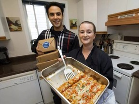 Scarf co-founder Kian Parseyan and Red Seal Chef Denise Hann posed for a photo in Hann's home in September. Scarf has been shut down by AHS. DAVID BLOOM / POSTMEDIA