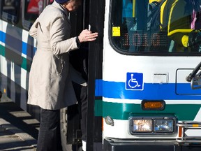 London Transit buses on Highbury in London, Ont. Photograph taken on Thursday November 10, 2016. Mike Hensen/The London Free Press/Postmedia Network