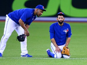 Edwin Encarnacion (left) and Jose Bautista (right) have both rejected qualifying offers from the Blue Jays on Monday, Nov. 14, 2016. (Dave Abel/Toronto Sun/Files)