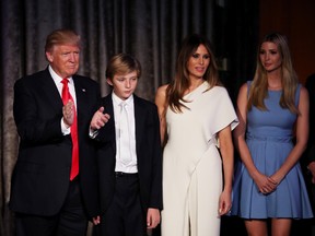 Republican president-elect Donald Trump, his son Barron Trump, wife Melania Trump, and daughter Ivanka Trump acknowledge the crowd during his election night event at the New York Hilton Midtown in the early morning hours of November 9, 2016. (Mark Wilson/Getty Images)
