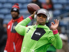 Seahawks quarterback Russell Wilson is joining investor Chris Hansen in trying to bring the NBA and NHL to Seattle. (AP Photo/Elaine Thompson) ORG XMIT: SEA101  Russell Wilson
