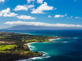This undated photo provided by the Hawaii Tourism Authority shows a view of the Kapalua coastline in Maui, Hawaii. (Tor Johnson/Hawaii Tourism Authority via AP)