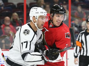 Dion Phaneuf of the Ottawa Senators battles against Jeff Carter of the Los Angeles Kings during second-period NHL action at Canadian Tire Centre in Ottawa on Nov. 11, 2016. (Jean Levac/Postmedia)