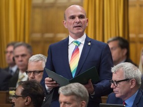 Liberal MP Randy Boissonnault rises during statements in the House of Commons, Monday June 13, 2016 in Ottawa. Prime Minister Justin Trudeau has named an Edmonton MP as his special advisor on LGBTQ2 issues.Randy Boissonnault will work with advocacy groups to promote equality for lesbians, gays, bisexual, transgender, queer and two-spirited people - a term used broadly to describe indigenous people who identify as LGBTQ. (THE CANADIAN PRESS/Adrian Wyld)