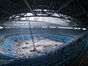 This Oct. 3, 2016, file photo shows inside view of the soccer stadium, which is under construction on Krestovsky Island, in St.Petersburg, Russia. (AP Photo/Dmitri Lovetsky, file)