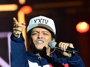 Bruno Mars performs at the MTV Europe Music Awards earlier this month. He's booked to play MTS Centre on Aug. 2. (Emmanuel DUNANDEMMANUEL DUNAND/AFP/Getty Images)