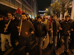 Leftist demonstrators march in protest against the visit of US President Barack Obama in Athens, Tuesday, Nov. 15, 2016. Obama is in Athens for talks with the country's political leadership and is scheduled to deliver a speech on Wednesday before heading to Berlin later the same day as part of his last major trip abroad. (AP Photo/Thanassis Stavrakis)