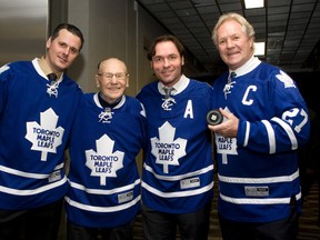 Felix Potvin, Johnny Bower, Darcy Tucker and Darryl Sittler pose for a photo on Jan. 21, 2013. Pete Fisher/Northumberland Today)