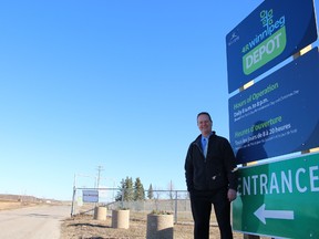 Manitoba's NDP environment critic, Rob Altemeyer (right), speaks at the Brady Road landfill on Tuesday. Altemeyer is urging the province to invest carbon price revenues in curbside composting for the province's major cities. (JOYANNE PURSAGA/Winnipeg Sun)