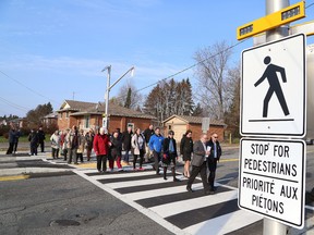 Greater Sudbury's first pedestrian crossover at Barrydowne Road and Woodbine Avenue was unveiled in Sudbury, Ont. on Tuesday November 15, 2016. John Lappa/Sudbury Star/Postmedia Network