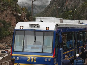 In this April 1, 2010 file photo, a train waits for passengers at the Piscacucho train station prior to departing toward the citadel of Machu Picchu in Cuzco, Peru. A local protest has temporarily suspended the train service on Tuesday, Nov. 15, 2016 that takes tourists to the ancient Incan citadel of Machu Picchu, the most visited place in Peru. (AP Photo/Karel Navarro, File)