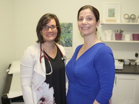 Dr. Sarah Arrowsmith, left, and Dr. Veronica Legnini, in Kingston, Ont. on Monday, November 14, 2016, are among the organizers of next week's health fair, which aims to provide people with information about the healthcare system as well as discuss ways to improve it. Michael Lea The Whig-Standard Postmedia Network