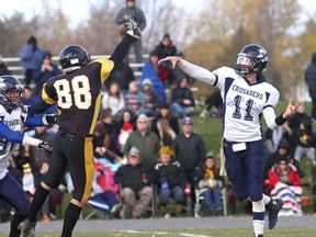 Drew Marquette of the La Salle Black Knights knocks down a pass by quarterback Josh Hare of the St. Mary's Crusaders of Brockville during an Eastern Ontario senior football semifinal game at La Salle Secondary School on Nov. 11. The Knights host Almonte in the regional final Friday afternoon. (Ian MacAlpine/The Whig-Standard)