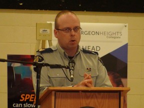 RCMP Traffic Officer Sgt. Mark Hume tells Sturgeon Heights students about the terror of deaths on highways.  
Jim Bender/Winnipeg Sun