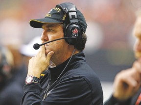 Kent Austin, who wears many hats for the Tiger-Cats, sidestepped queries about whether or not he is ready to relinquish some of his many duties with the team. (Al Charest, Postmedia files)