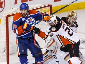 Patrick Maroon, shown here battling Shawn Horcoff in a game in Edmonton last March, returns to Anaheim Tuesday for the first time since the February trade that sent him to the Oilers. (Ian Kucerak)