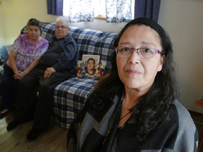 Arlene Sams (right) with her parents Louise and Charlie Sams at their home in Edmonton. An Edmonton Police Service constable pleaded guilty to neglect of duty for wrongfully arresting and charging Arlene Sams with refusal to blow into a breathalyzer and accusing her wrongfully of drunk driving in 2014. Larry Wong/Postmedia