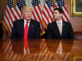 In this Nov. 10, 2016, photo, President-elect Donald Trump and House Speaker Paul Ryan of Wis., pose for photographers after a meeting in the Speaker's office on Capitol Hill in Washington. (AP Photo/Alex Brandon)