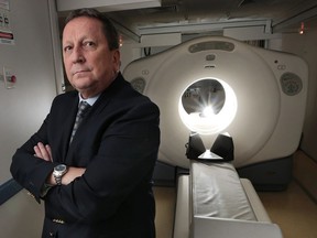 Dr. Kevin Tracey is shown with a PET scanner on Wednesday, June 22, 2016, in Windsor. (DAN JANISSE/Postmedia Network)