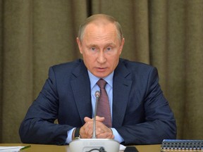 Russian President Vladimir Putin heads a meeting on military industry issues in the Black Sea resort of Sochi, Russia, Tuesday, Nov. 15, 2016. (Alexei Druzhinin/Sputnik, Kremlin Pool Photo via AP)