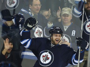 Winnipeg Jets defenceman Josh Morrissey celebrates his goal against the Chicago Blackhawks on Tuesday night. The Jets head out on the road for a five-game trip that starts Thursday in Philadelphia. (Brian Donogh/Winnipeg Sun)