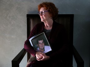 Tim Miller/The Intelligencer
Kathleen Brooks holds a picture of her son, Darrin, at her home in Prince Edward County. Her son's death due to massive brain trauma from a motorcycle crash set Brooks on a mission to reform the policies surrounding victims of severe trauma.