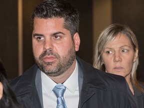 Witness Hugo Tremblay, centre, former aide of former Montreal Mayor Michael Applebaum, during a break in Applebaum's trial on corruption charges at the Montreal Courthouse on Tuesday, November 15, 2016. DARIO AYALA/Postmedia Network