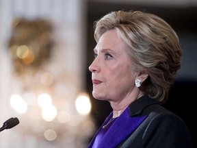 Hillary Clinton pauses while speaking in New York, Wednesday, Nov. 9, 2016, where she conceded her defeat to Republican Donald Trump after the hard-fought presidential election. (AP Photo/Andrew Harnik)